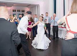 Wedding couple dancing at their reception